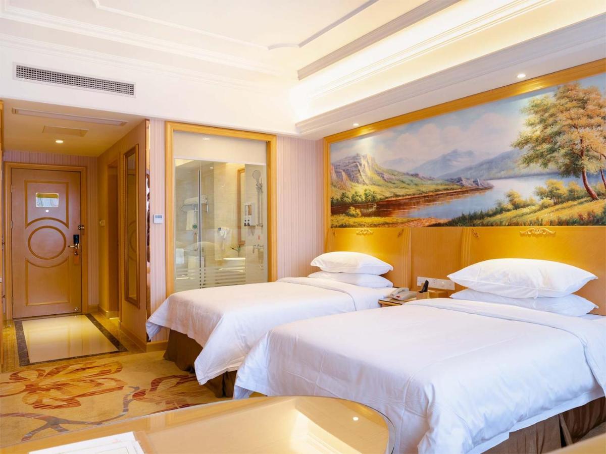 ניאו בה ליאן Vienna International Hotel Shanghai Pudong New District Dishui Lake Univeristy City מראה חיצוני תמונה