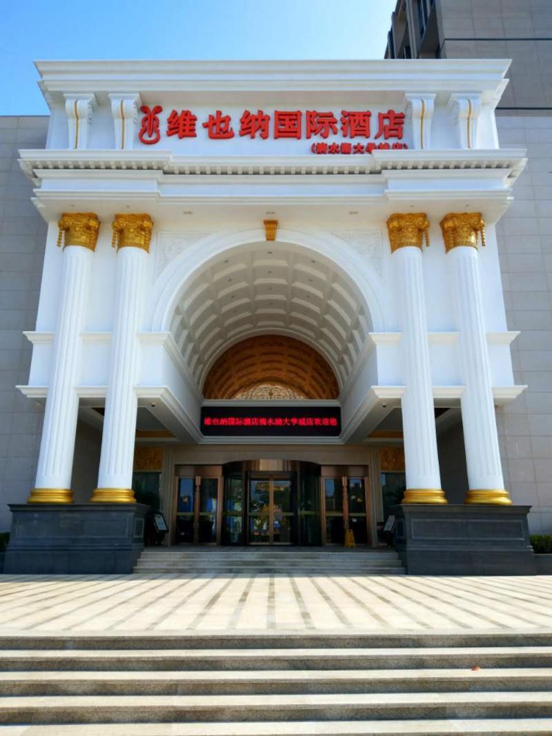 ניאו בה ליאן Vienna International Hotel Shanghai Pudong New District Dishui Lake Univeristy City מראה חיצוני תמונה